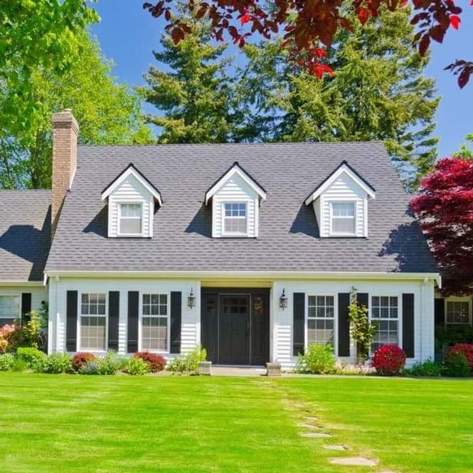 Vinyl-siding-white-house-black-shutter